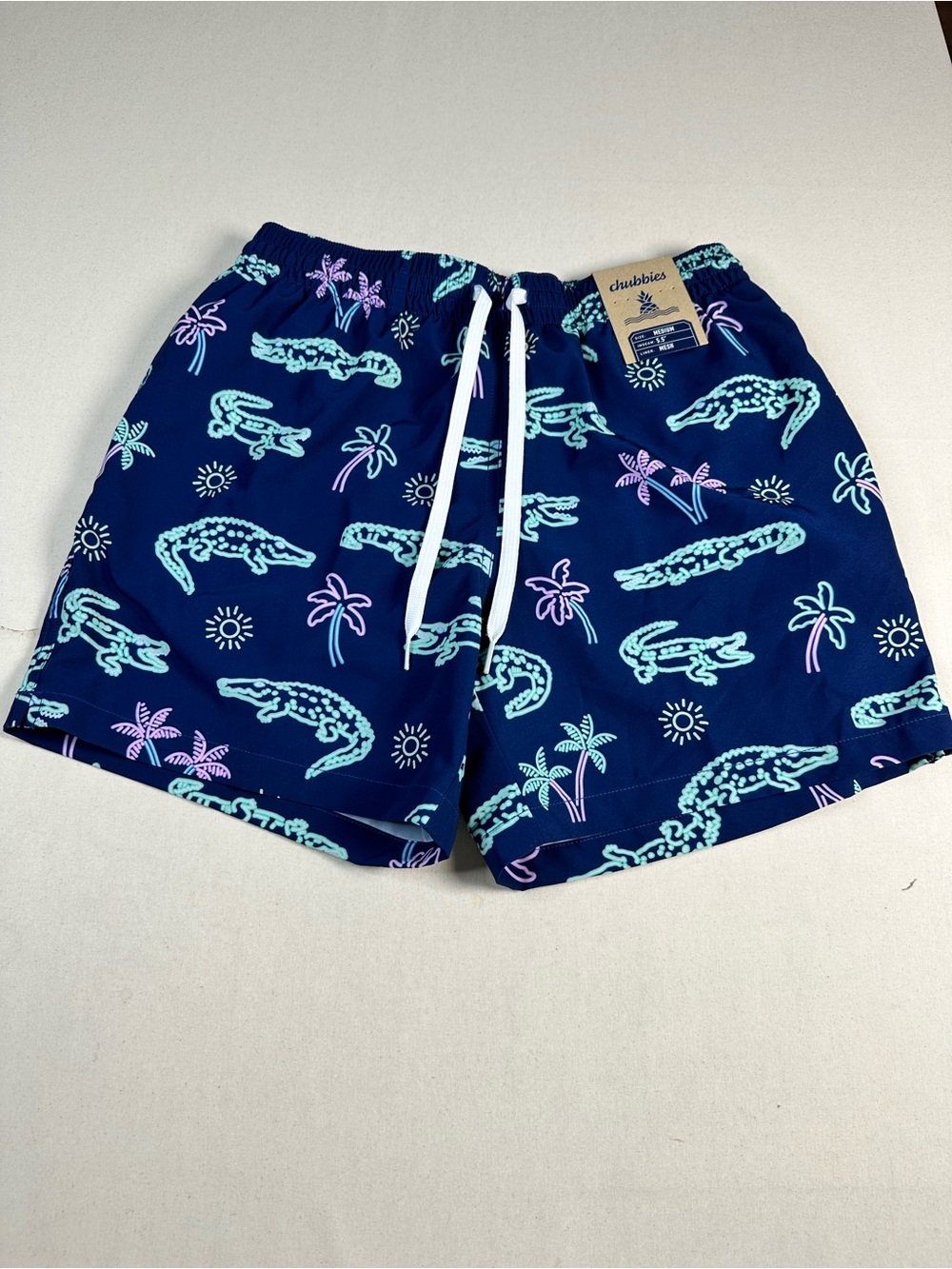 chubbies Navy Swim Shorts with Mint & Light Pink Alligator Print medium 5.5”